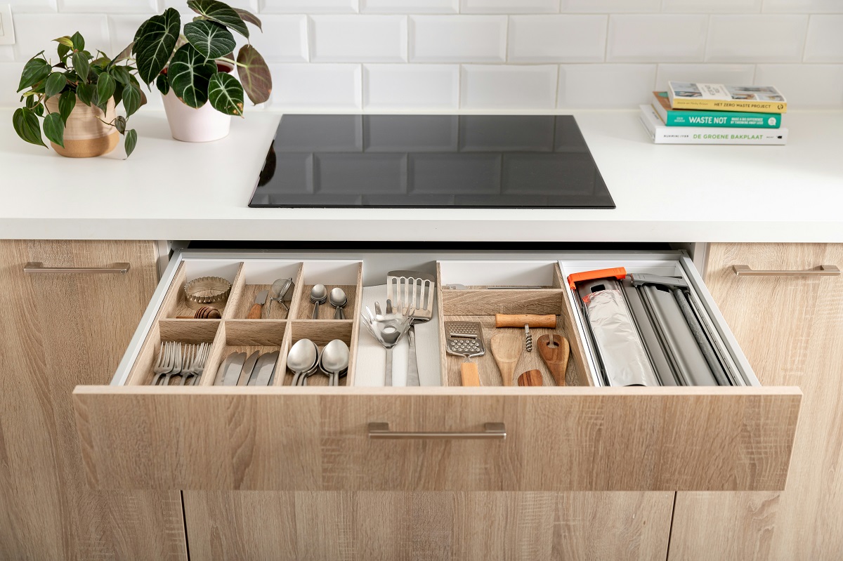 kitchen drawer filled with utensils